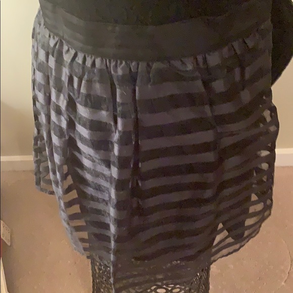 A fun, black mini dress for any occasion - Picture 4 of 4